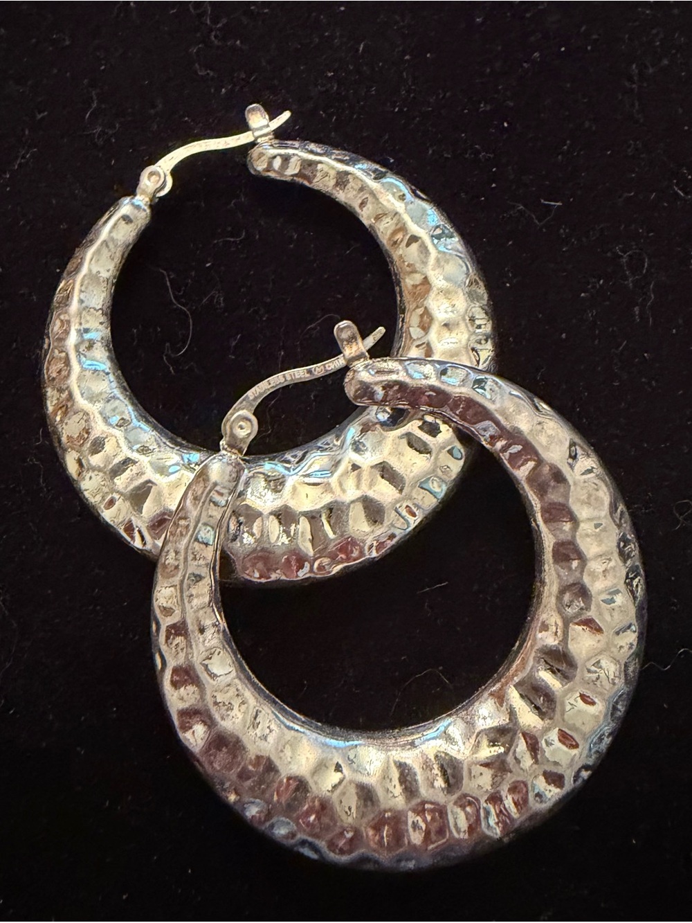 Silver Infinity Circle Earrings with Textured Design